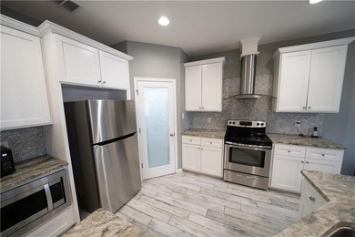 Exquisite 4 bedroom, 3 bath home with a 2 car garage, featuring - photo 11