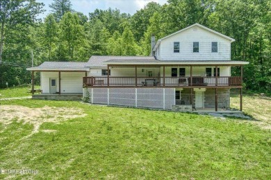 Lake Home For Sale in Deer Lodge, Tennessee