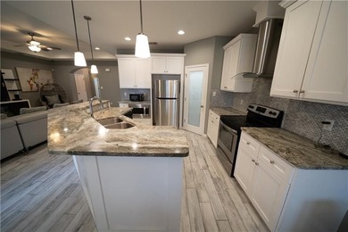 Exquisite 4 bedroom, 3 bath home with a 2 car garage, featuring - photo 12