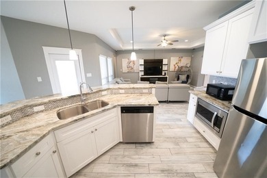 Exquisite 4 bedroom, 3 bath home with a 2 car garage, featuring - photo 14