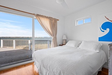 Discover a rare bayfront offering in Westhampton Dunes, where - photo 16