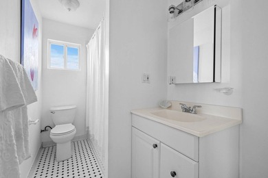 Discover a rare bayfront offering in Westhampton Dunes, where - photo 18