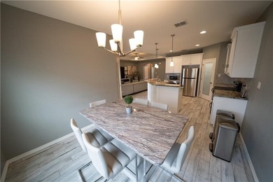 Exquisite 4 bedroom, 3 bath home with a 2 car garage, featuring - photo 19