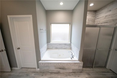 Exquisite 4 bedroom, 3 bath home with a 2 car garage, featuring - photo 21