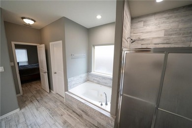 Exquisite 4 bedroom, 3 bath home with a 2 car garage, featuring - photo 22