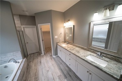 Exquisite 4 bedroom, 3 bath home with a 2 car garage, featuring - photo 23