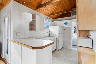 Discover a rare bayfront offering in Westhampton Dunes, where - photo 31