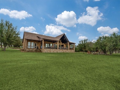 See to believe! Enjoy this gently sloping lawn onto a rare sandy - photo 34