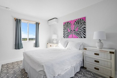 Discover a rare bayfront offering in Westhampton Dunes, where - photo 34