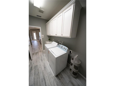 Exquisite 4 bedroom, 3 bath home with a 2 car garage, featuring - photo 35