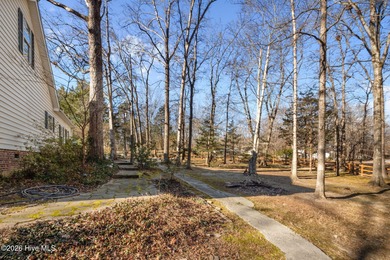 Welcome to your own private retreat. This expansive 4-bedroom