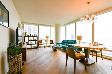 Experience elevated city living in this highly desirable - photo 1