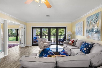 Spacious 3-bedroom, 2-bath condo featuring wood-look tile - photo 3