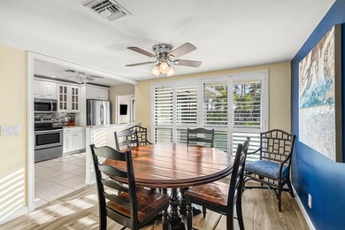 Spacious 3-bedroom, 2-bath condo featuring wood-look tile - photo 4