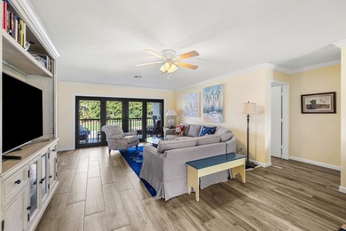 Spacious 3-bedroom, 2-bath condo featuring wood-look tile - photo 8