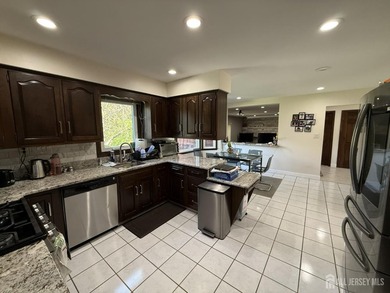 Welcome home to this beautifully updated Colonial, ideally - photo 7