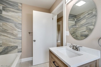 Move-in ready with extensive updates! New windows, flooring - photo 18