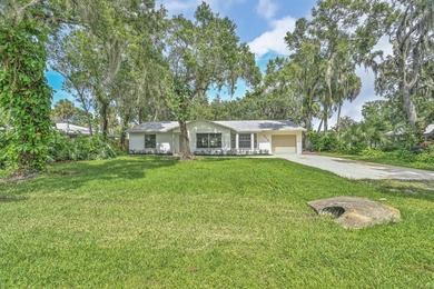 Welcome home to this beautifully remodeled residence nestled in - photo 2