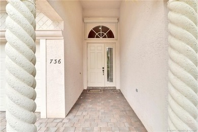 Step into light-filled elegance in this meticulously maintained - photo 3