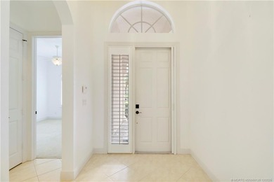 Step into light-filled elegance in this meticulously maintained - photo 4