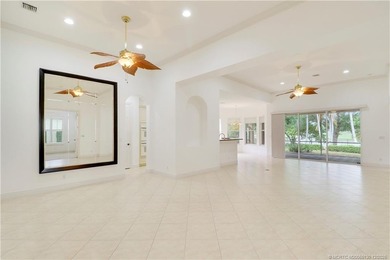 Step into light-filled elegance in this meticulously maintained - photo 6