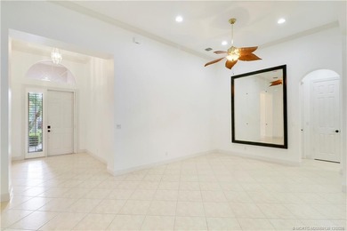 Step into light-filled elegance in this meticulously maintained - photo 8