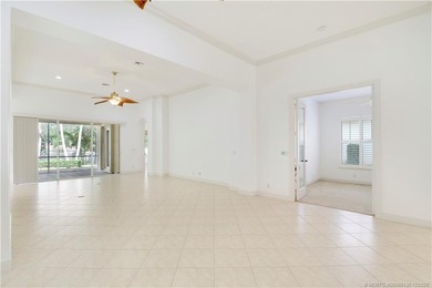 Step into light-filled elegance in this meticulously maintained - photo 9