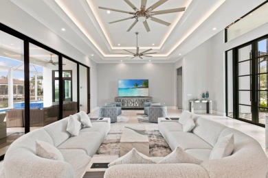 A Waterfront Masterpiece of Modern Island Living! Bold, fresh