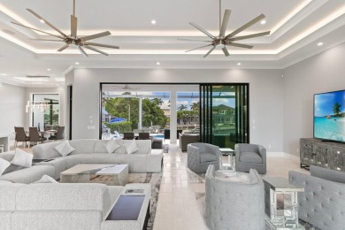 A Waterfront Masterpiece of Modern Island Living! Bold, fresh