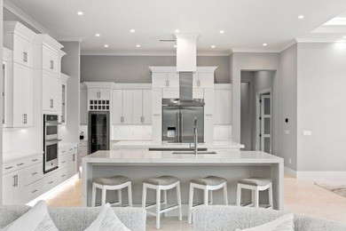 A Waterfront Masterpiece of Modern Island Living! Bold, fresh