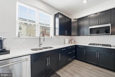 Your opportunity to own a nearly new, four-level townhome at a - photo 12
