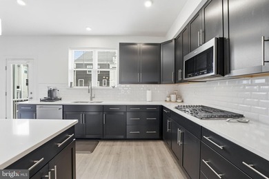 Your opportunity to own a nearly new, four-level townhome at a - photo 14
