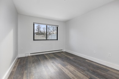 Tastefully remodeled first floor unit with a unique