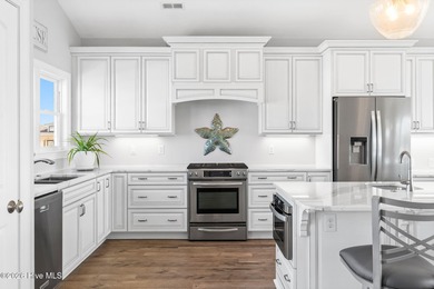 Beach access directly across the street sets the tone for this