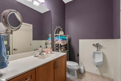 Experience historic charm and modern luxury in this beautifully