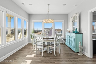 Beach access directly across the street sets the tone for this