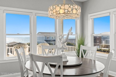 Beach access directly across the street sets the tone for this