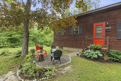 Tucked among the trees in the Richmond Shores community, this - photo 2