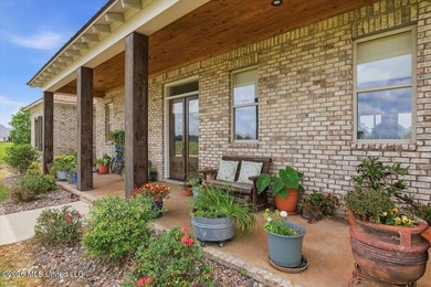 Experience refined country living in the prestigious gated - photo 7