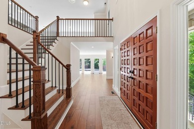 Tucked away on 5 private wooded acres with a peaceful pond, this - photo 9