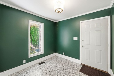 Tucked away on 5 private wooded acres with a peaceful pond, this - photo 10