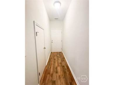 Welcome home to this end unit townhome with over 1,400 sq ft in - photo 3