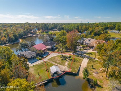 Waterfront opportunity on the Tchoutacabouffa River! This lot - photo 1