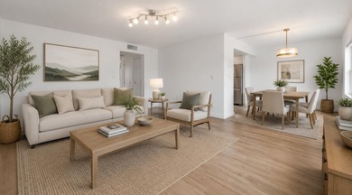 Beautiful corner unit featuring 2 bedrooms and 2 bathrooms with - photo 2