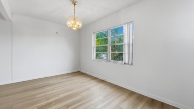 Beautiful corner unit featuring 2 bedrooms and 2 bathrooms with - photo 5
