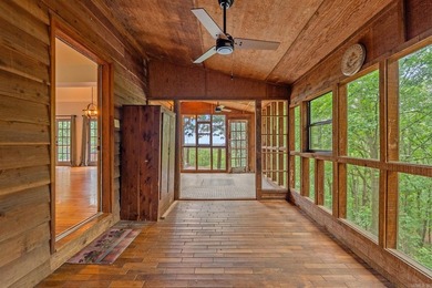 Nestled on 5 private wooded acres, this custom log home offers - photo 12