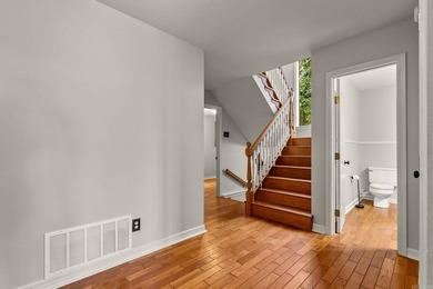 Nestled on 5 private wooded acres, this custom log home offers - photo 20