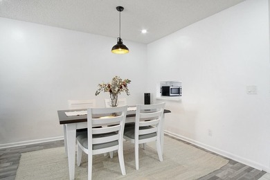 Beautifully updated 2-bedroom, 2-bath second-floor condo located - photo 6