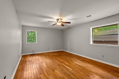Nestled on 5 private wooded acres, this custom log home offers - photo 27