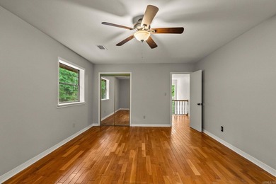 Nestled on 5 private wooded acres, this custom log home offers - photo 28